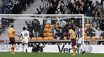 Sutton (not in picture) scores Saints' first