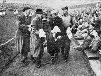 George Liddell is carried from the field 
