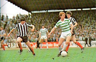 Lex Richardson and Billy Stark closely monitor Celtic's Tommy Burns